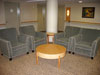Lounge chairs, coffee and end tables for healthcare facility